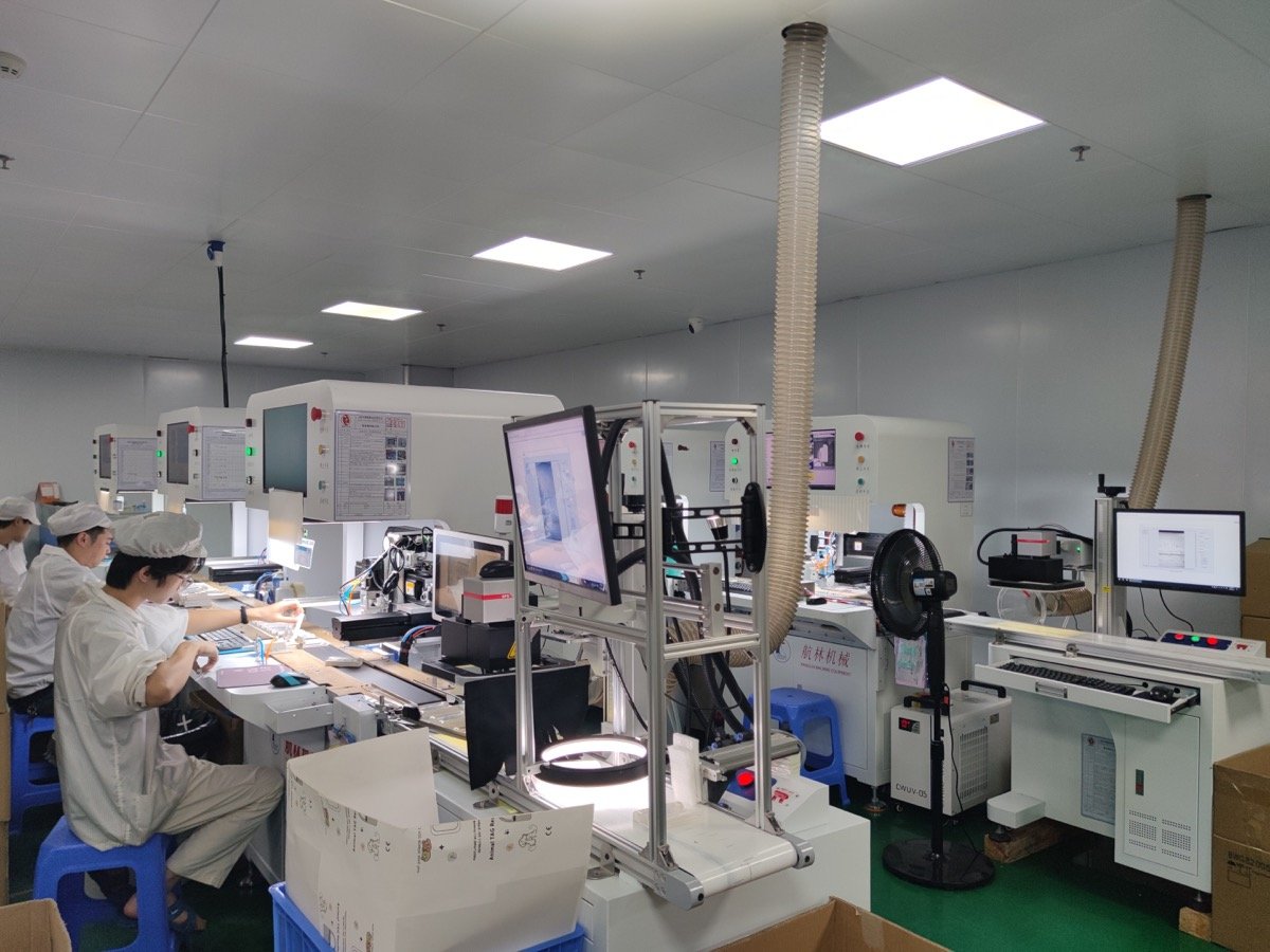 JJT screen protector factory — film cutting workshop